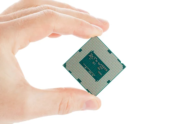 Der Prozessor des Computers in der Hand, die isoliert auf weißem Hintergrund — Stockfoto