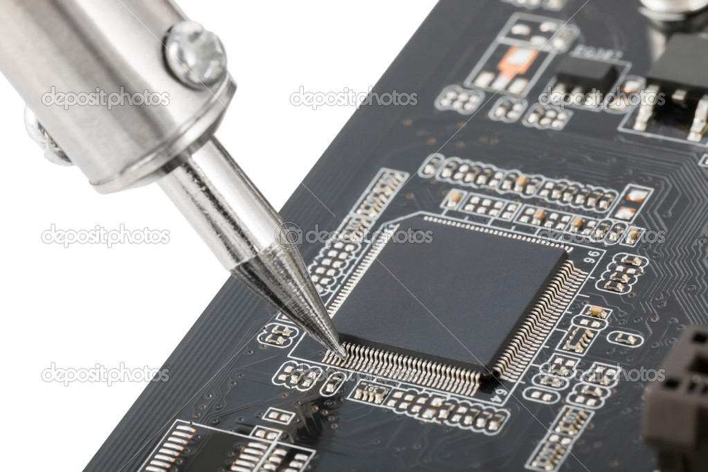 Close up of electronic circuit board with several semiconductors