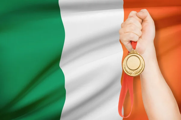 Medal w parze z flagi na tle - Irlandia — Zdjęcie stockowe