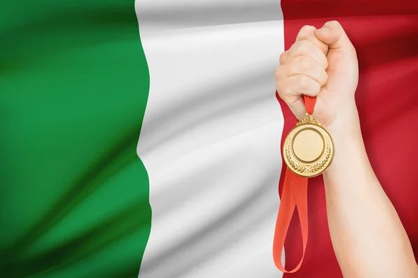 Medalla de la mano con la bandera en el fondo - Italia — Foto de Stock
