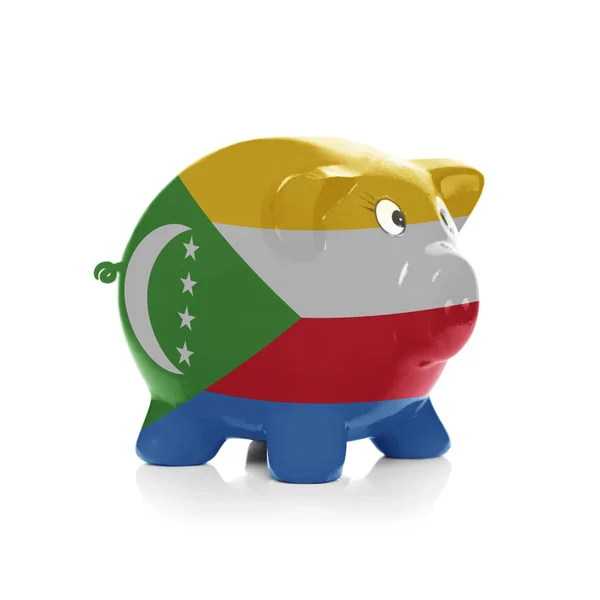 Piggy bank met vlag coating overheen - Comoren — Stockfoto