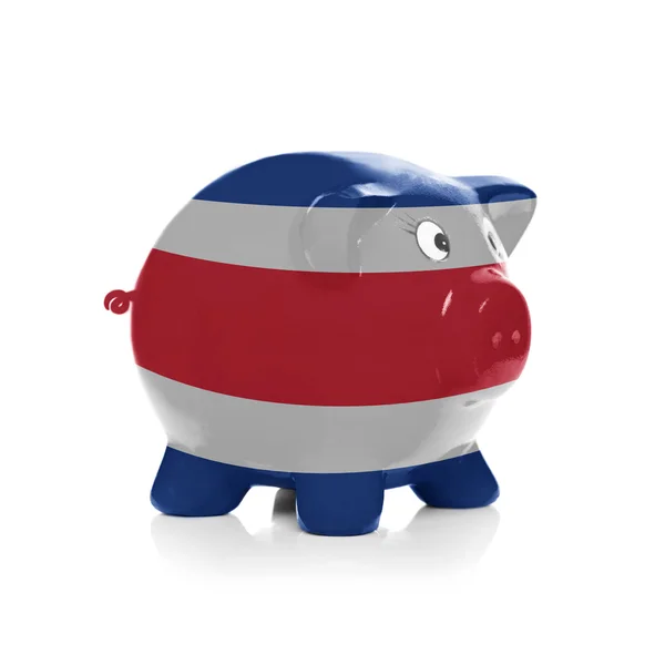 Piggy bank met vlag coating overheen - costa rica — Stockfoto