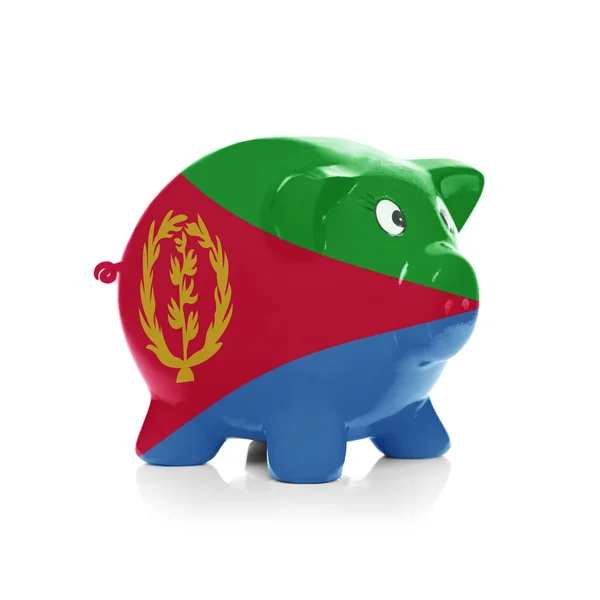 Piggy bank met vlag coating overheen - eritrea — Stockfoto