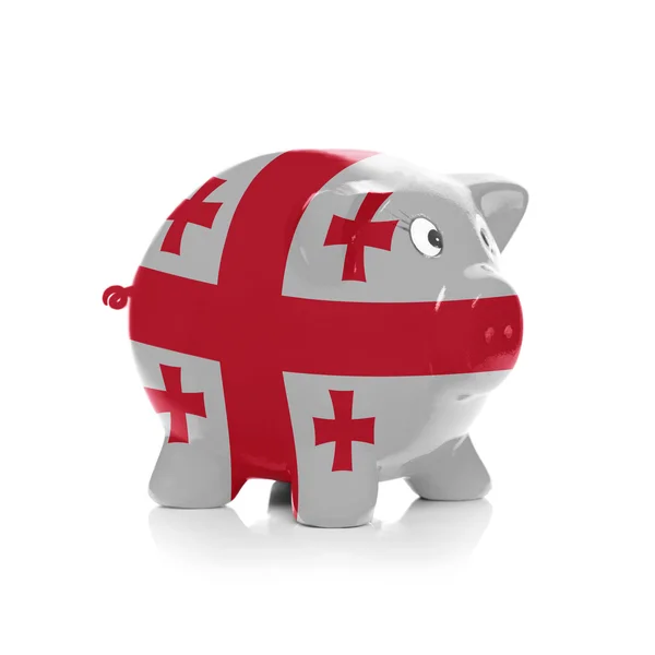 Piggy bank with flag coating over it - Georgia — Stock Photo, Image