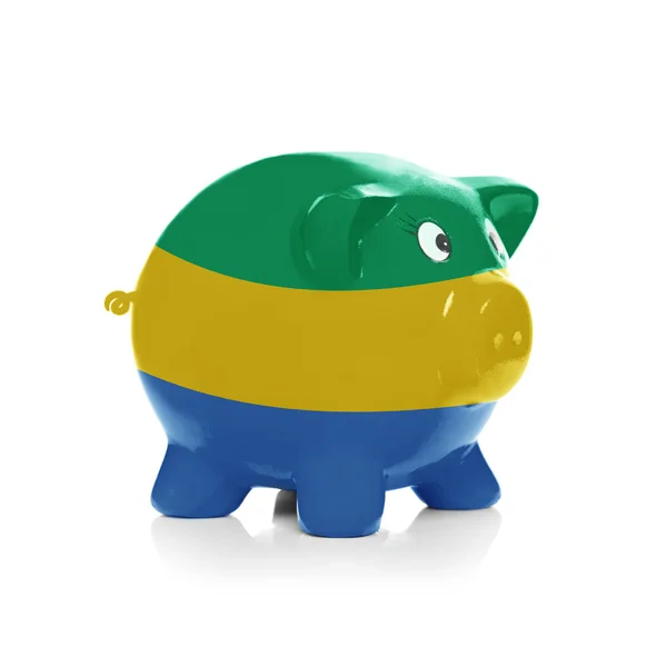 Piggy bank with flag coating over it - Gabon — Stock Photo, Image