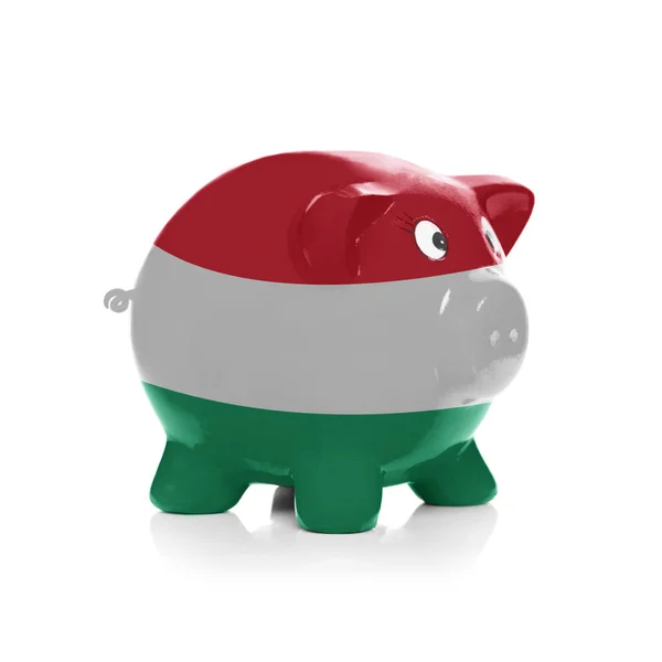 Sparschwein mit Flagge Beschichtung drüber - Ungarn — Stockfoto