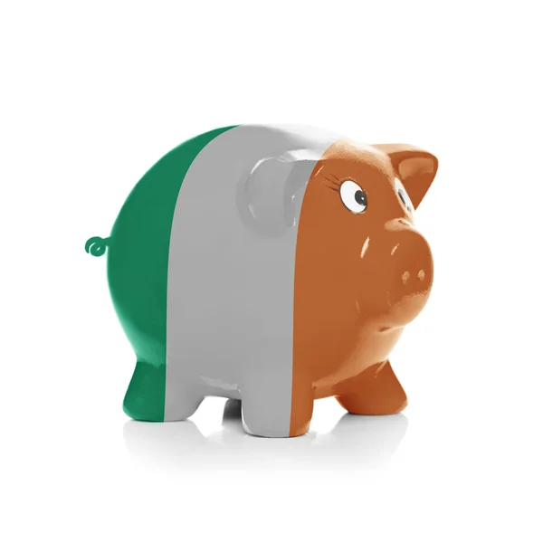 Sparschwein mit Flagge Beschichtung drüber - Irland — Stockfoto