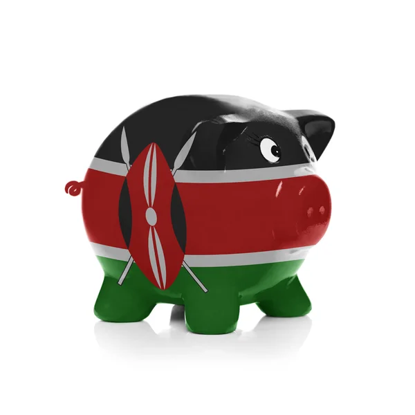 Piggy bank with flag coating over it - Kenya — Stock Photo, Image