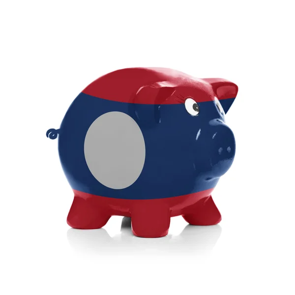 Piggy bank met vlag coating overheen - laos — Stockfoto