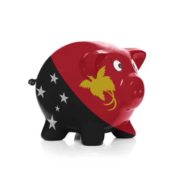 Piggy bank a zászló bevonat rajta - Pápua Új-guinea — Stock Fotó