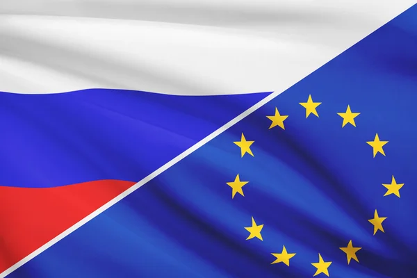 Serie von gekräuselte Flags. Russland und der Europäischen union. — Stockfoto