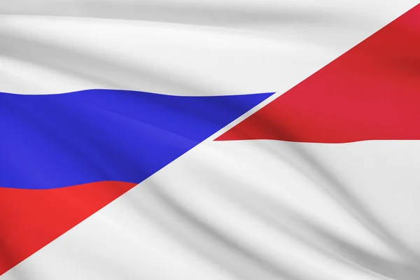 Serie von gekräuselte Flags. Russland und Indonesien. — Stockfoto