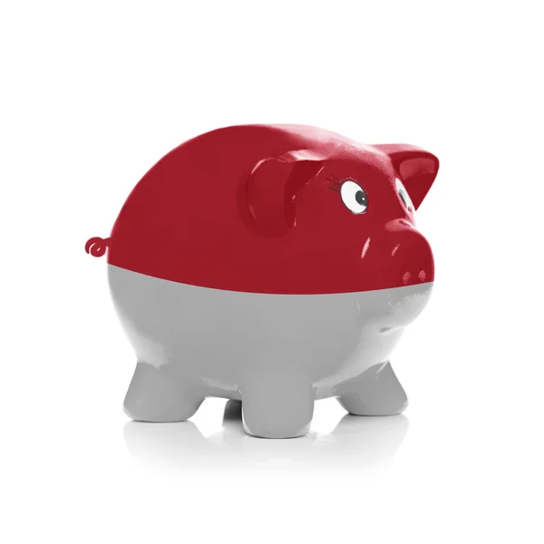 Piggy bank with flag coating over it - Monaco — Stock Photo, Image