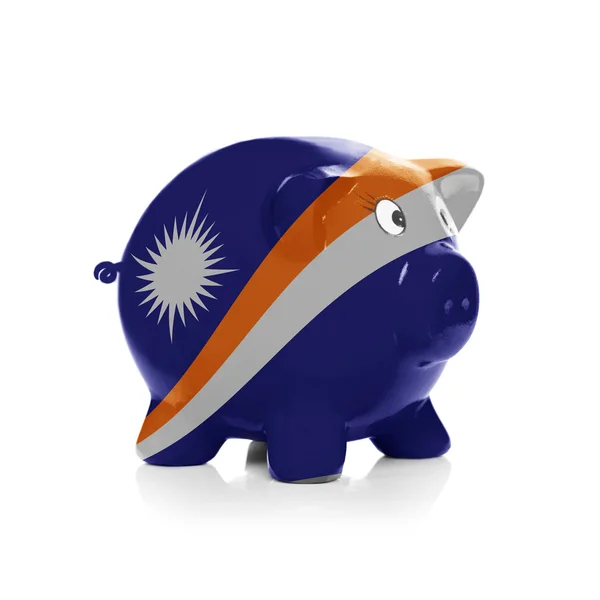 Piggy bank with flag painting over it - Marshall Islands — Stock Photo, Image