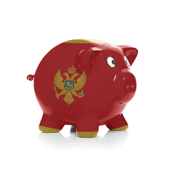 Piggy bank with flag painting over it - Montenegro — Stock Photo, Image