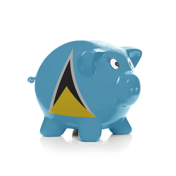 Piggy bank met vlag coating overheen - saint lucia — Stockfoto