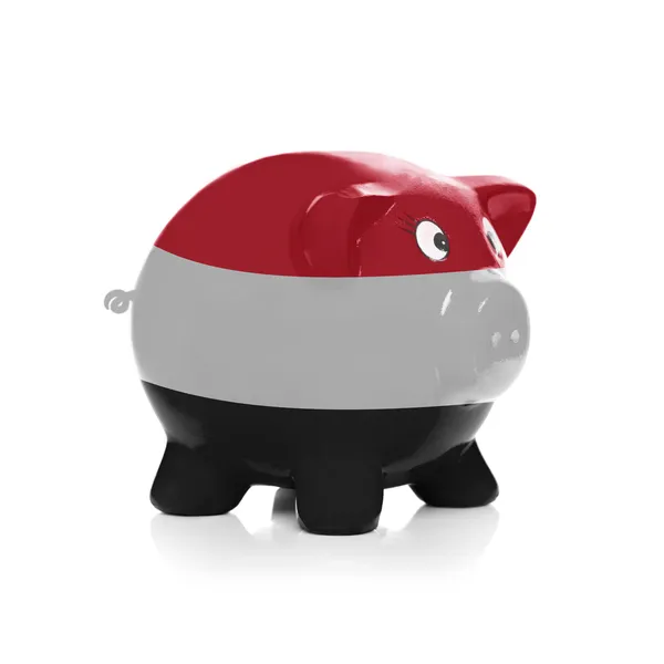 Piggy bank with flag coating over it - Yemen — Stock Photo, Image