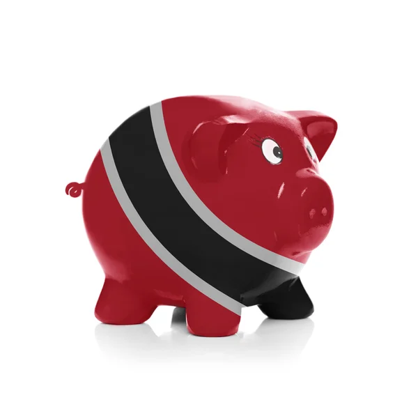 Piggy bank with flag coating over it - Trinidad and Tobago — Stock Photo, Image