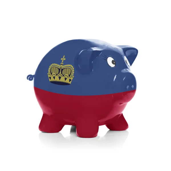Piggy bank with flag painting over it - Liechtenstein — Stock Photo, Image