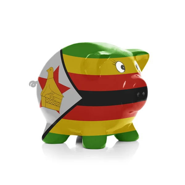 Piggy bank with flag painting over it - Zimbabwe — Stock Photo, Image