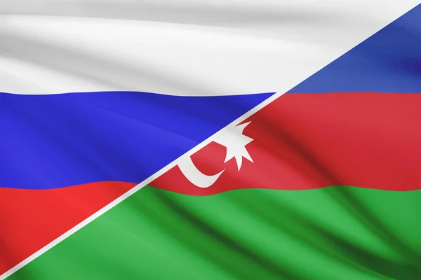 Serie von gekräuselte Flags. Russland und Aserbaidschan. — Stockfoto