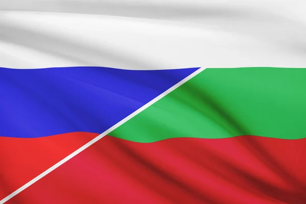 Серия трепал флагов. Россия и Болгария. — стоковое фото