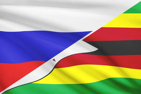 Series of ruffled flags. Russia and Republic of Zimbabwe. — Stock Photo, Image