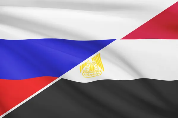 Series of ruffled flags. Russia and Arab Republic of Egypt. — Stock Photo, Image