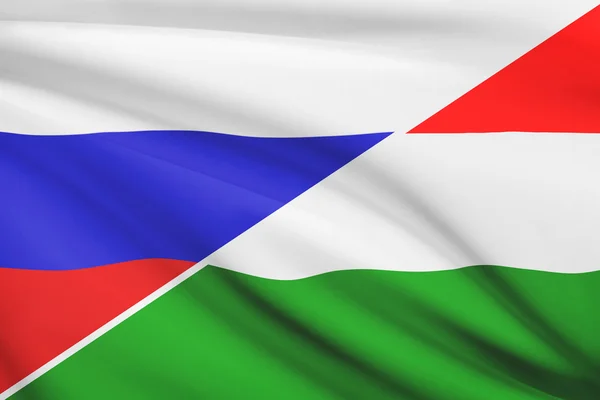 Series of ruffled flags. Russia and Hungary. — Stock Photo, Image