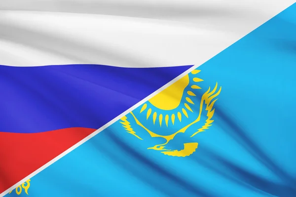系列的竖起旗帜。俄罗斯联邦和哈萨克斯坦共和国. — 图库照片