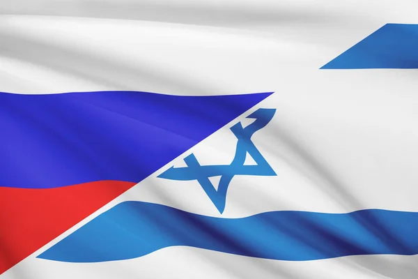 Series of ruffled flags. Russia and State of Israel. — Stock Photo, Image