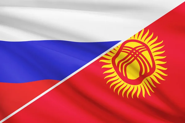 Series of ruffled flags. Russia and Kyrgyz Republic. — Stock Photo, Image