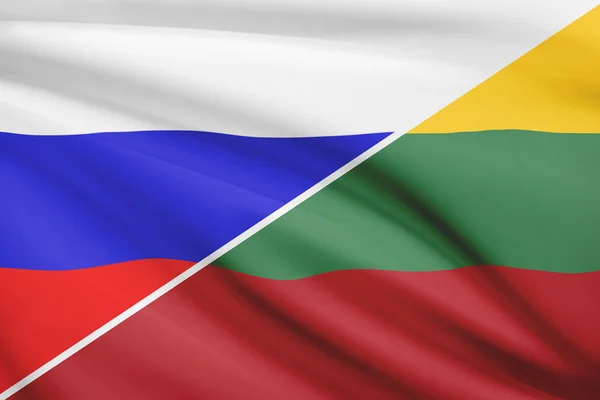 Series of ruffled flags. Russia and Republic of Lithuania.