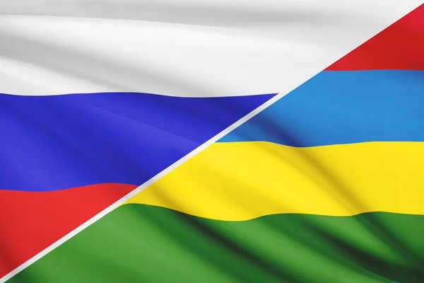 Series of ruffled flags. Russia and Republic of Mauritius. — Stock Photo, Image