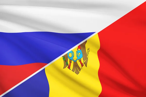 Serie von gekräuselte Flags. Russland und Moldawien. — Stockfoto