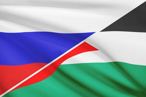 Seria potargane flagi. Rosja i państwa palestyńskiego. — Zdjęcie stockowe