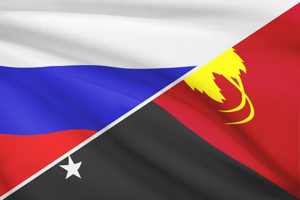 Serie von gekräuselte Flags. Russland und der unabhängige Staat von Papua-Neuguinea. — Stockfoto