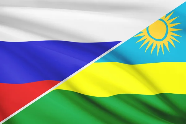 Series of ruffled flags. Russia and Republic of Rwanda.