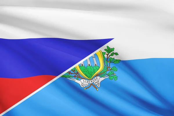 Series of ruffled flags. Russia and Republic of San Marino. — Stock Photo, Image