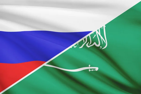 Serie von gekräuselte Flags. Russland und Saudi Arabien. — Stockfoto