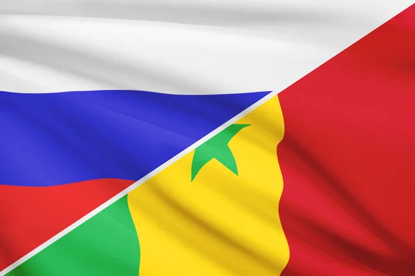 Serie von gekräuselte Flags. Russland und der Republik senegal. — Stockfoto