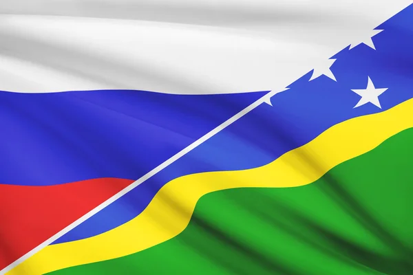 Series of ruffled flags. Russia and Solomon Islands. — Stock Photo, Image