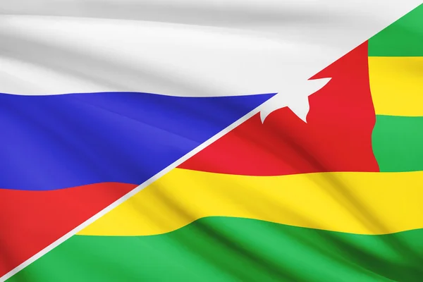 Serie von gekräuselte Flags. Russland und Republique togolaise. — Stockfoto