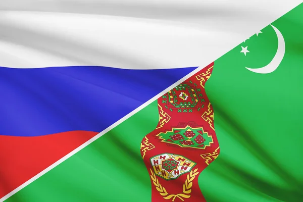 Serie von gekräuselte Flags. Russland und turkmenistan. — Stockfoto
