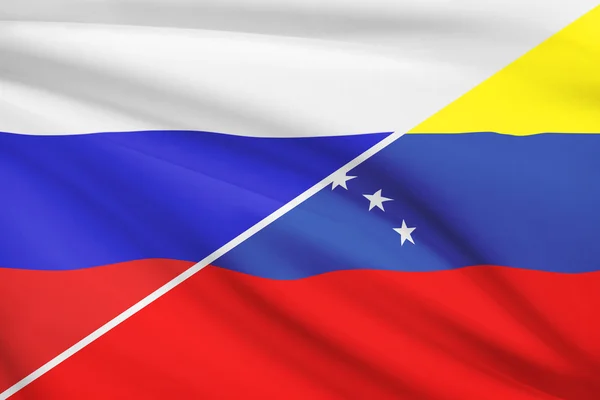 Serie von gekräuselte Flags. Russland und Bolivarische Republik venezuela. — Stockfoto