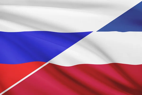 Series of ruffled flags. Russia and Socialist Federal Republic of Yugoslavia. — Stock Photo, Image