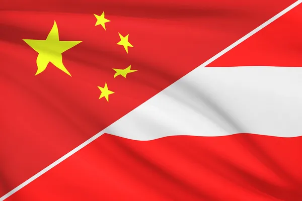 Series of ruffled flags. China and Republic of Austria. — Stock Photo, Image