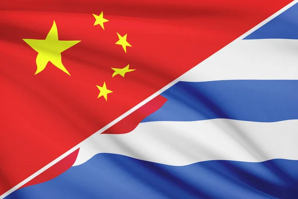 Series of ruffled flags. China and Republic of Cuba. — Stock Photo, Image