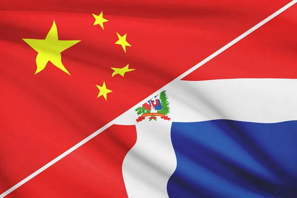 Series of ruffled flags. China and Dominican Republic. — Stock Photo, Image