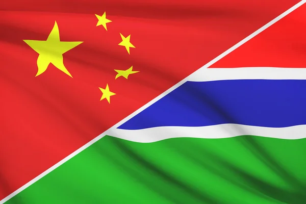 Series of ruffled flags. China and Republic of the Gambia. — Stock Photo, Image